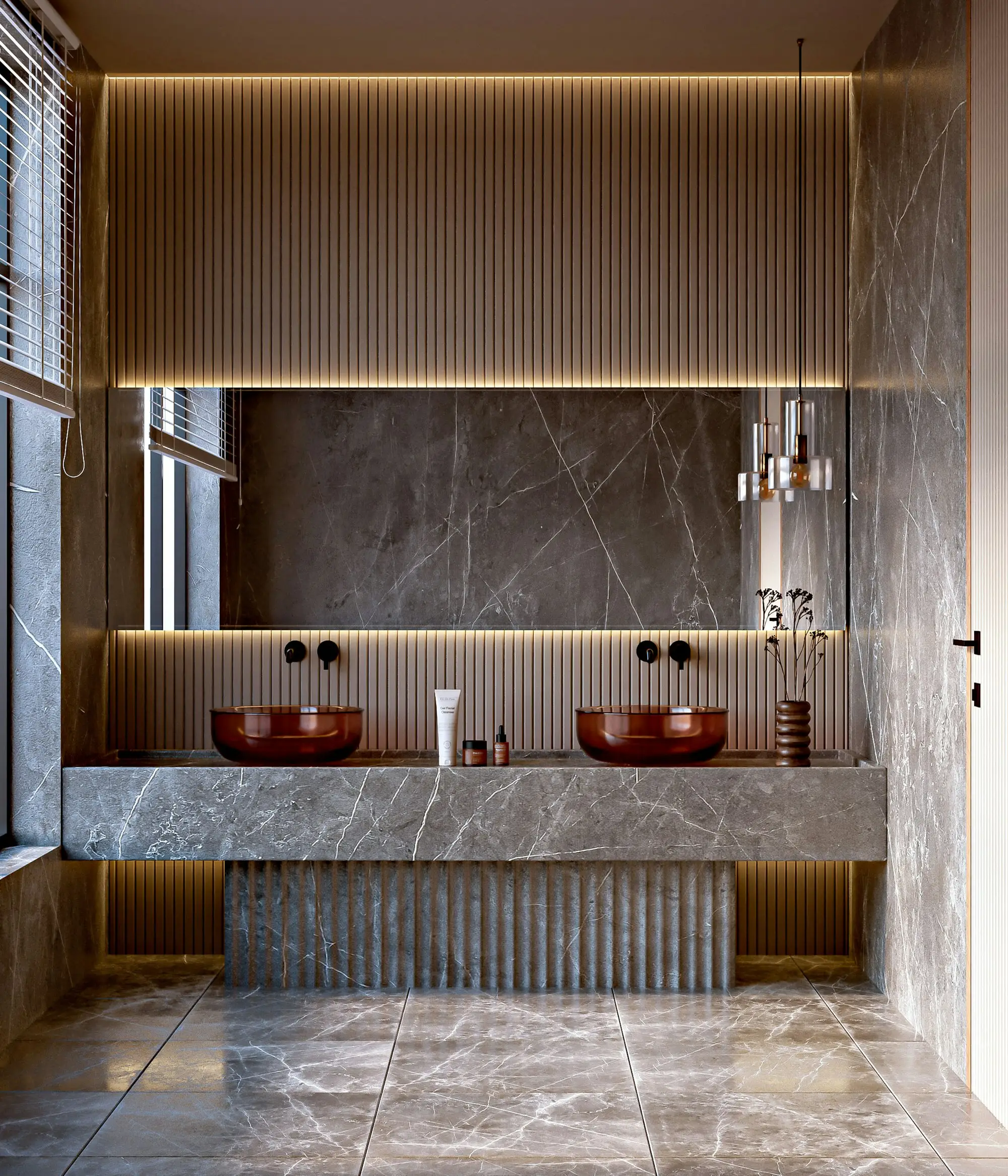 Marble double vanity with a large mirror in a finished bathroom