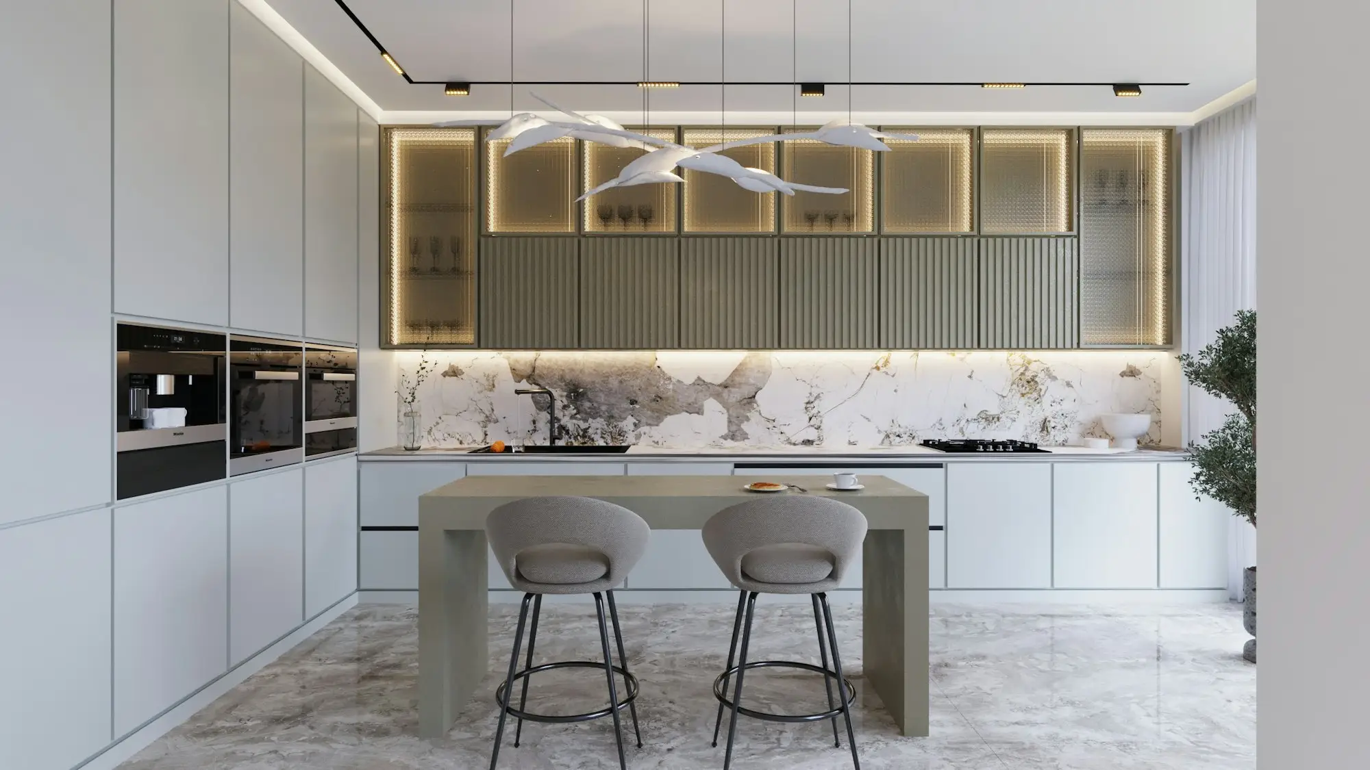A marble kitchen with a long island and wooden stools