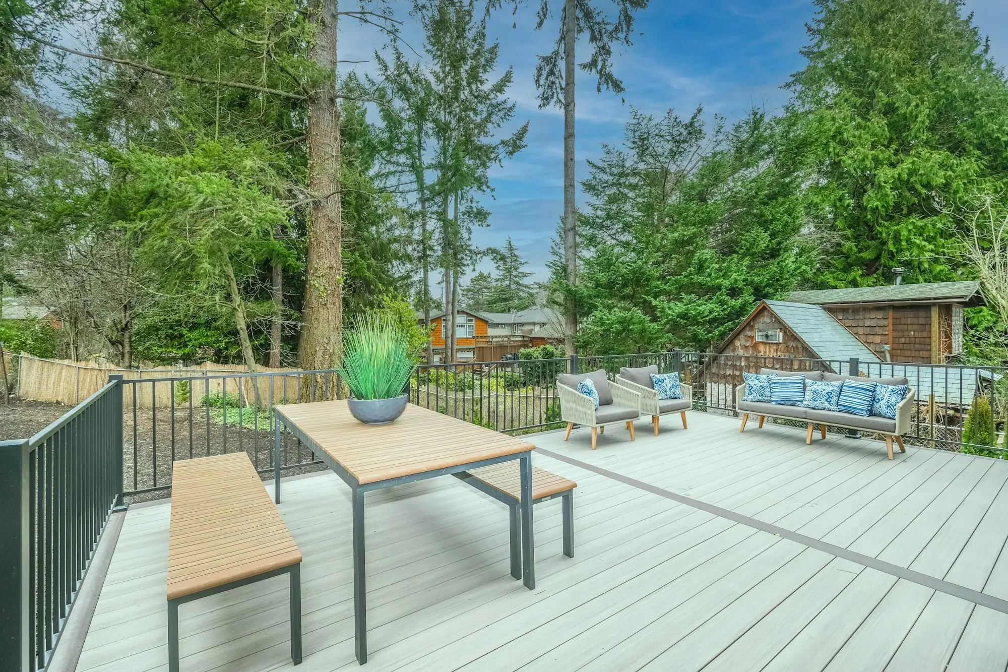 Wood deck set with a dining table and chairs